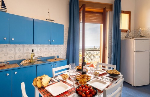 Scala di Furno House | Holiday Home 'The Sunset Attico Panoramico' with Sea View, Wi-Fi and Air Conditioning