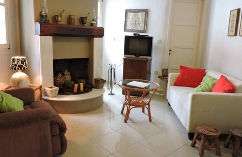 Andros Town House | Holiday Home 'Vaggos House' with Mountain View, Shared Terrace and Wi-Fi
