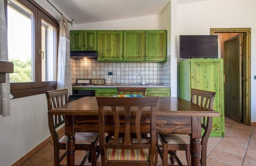 Paduledda House | Holiday Home "Vista Mozzafiato ad Isola Rossa" with Sea View, Private Terrace & A/C