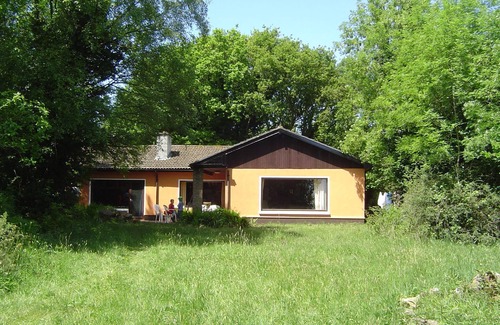 Woodford House | Holiday home with boat, romantically located between sea and moor
