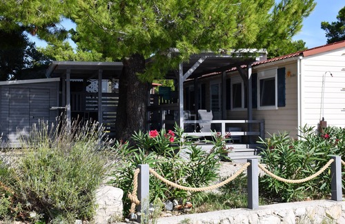 Pirovac House | Holiday house/mobile home in the 1. Line seafront, 34 m² + 24 m² terrace