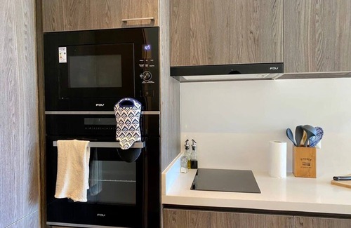 Puerto Varas Apartment | HOM I Terraza con vista parcial al Lago