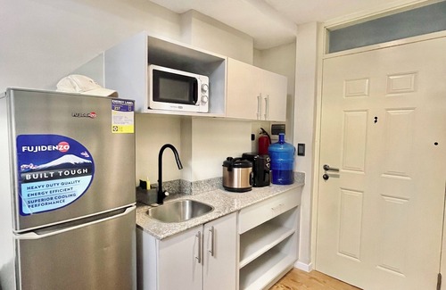 Lapu-Lapu Condo | Home-feel unit near Airport with an IG-worthy pool that’s perfect for your feed.