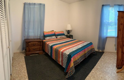 Huntsville Cottage | Home on Lake Conroe. Lakeview home on edge of National Forest, near Huntsville.