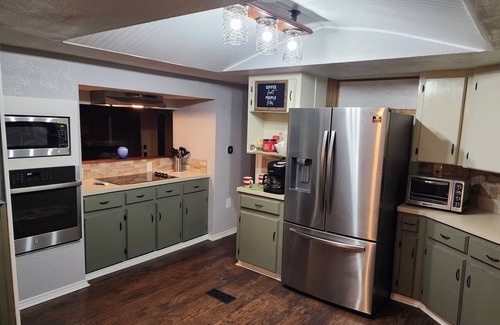 Enchanted Oaks House | Home ON the lake w/dock, gameroom/firepit. 2 FULL bath, 2 KING beds
