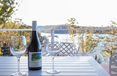 Lake Conjola House | Home On the Water Enjoy a relaxing lakeside hideaway at this charming and cosy