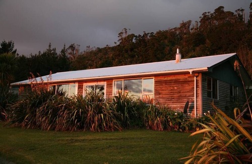 Mokihinui House | Home with stunning River and Ocean views. Pet-friendly