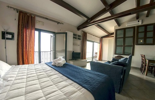 Capo Mulini House | Homerez - 10 m away from the beach! House for 8 ppl. with sea view at Acireale