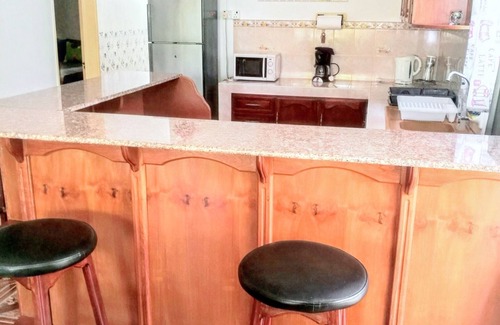 Flic-en-Flac Apartment | Homerez - Apt Flic en Flac, garden view