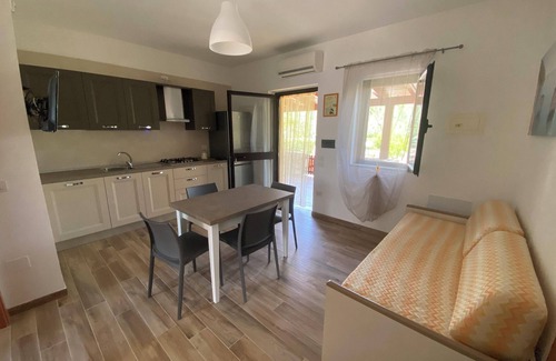 Chiesiola Apartment | Homerez - Charming Apartment in Vieste with Shared Pool and Garden