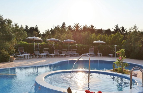 Chiesiola Apartment | Homerez - Charming Apartment in Vieste with Shared Pool and Garden