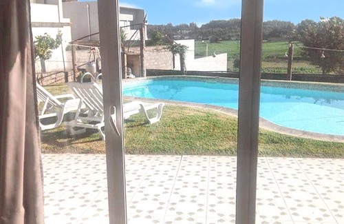 Vila Nova de Famalicao House | Homerez - Charming House in Requião with Shared Pool