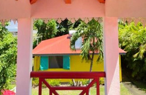 Sainte-Rose House | Homerez - House for 4 ppl. with shared pool, sea view and garden at Sainte-Rose