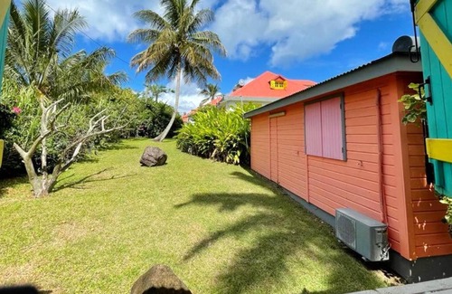 Sainte-Rose House | Homerez - House for 4 ppl. with shared pool, sea view and garden at Sainte-Rose
