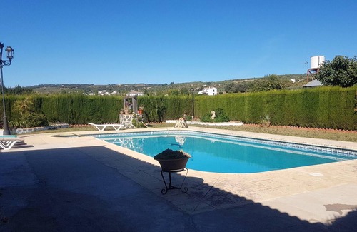 Arriate House | Homerez - House for 8 ppl. with swimming-pool, garden and terrace at Arriate
