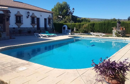 Arriate House | Homerez - House for 8 ppl. with swimming-pool, garden and terrace at Arriate