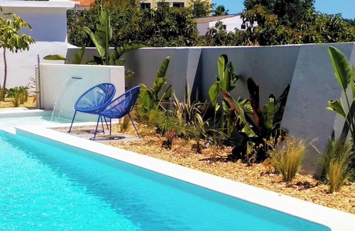 Vale de Seixos Apartment | Homerez - Modern apartment in Estói with shared pool.