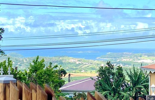 Le Francois Villa | Homerez - Nice villa for 4 ppl. with swimming-pool and sea view at Le François