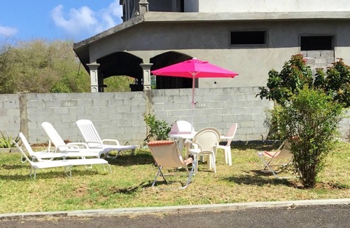 Calodyne Apartment | Homerez - Spacious apartment Near the beach and garden