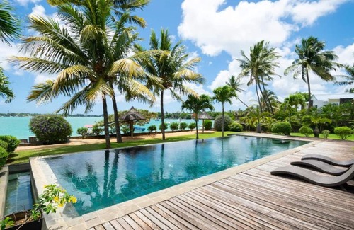 Pointe aux Canonniers Villa | Homerez - Villa for 8 ppl. with shared pool at Pointe aux Cannoniers, Grand Baie