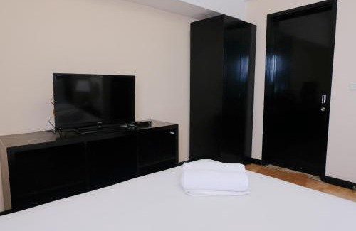 Braga Apartment | Homey 3BR Apartment at Braga City Walk By Travelio