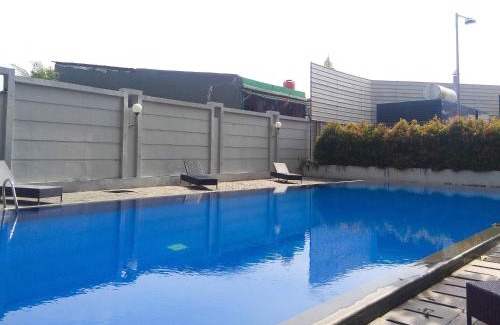 Jakarta Apartment | Homey and Comfy Studio at Tifolia Apartment By Travelio