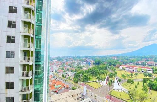 Cileunyi Apartment | Homey Studio Room at Harvard Jatinangor Apartment By Travelio