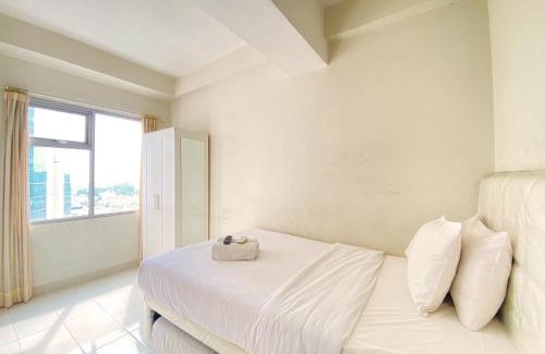Cileunyi Apartment | Homey Studio Room at Harvard Jatinangor Apartment By Travelio