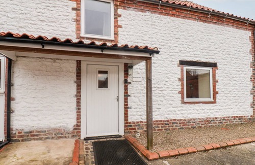 Reighton Cottage | HONEYSUCKLE, pet friendly, with hot tub in Filey