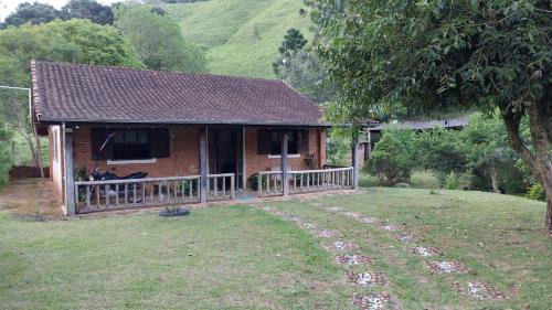 Aiuruoca House | Hospedagem Manacás
