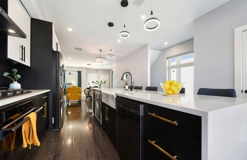 Lawrenceville House | ★ HostWise Stays ★ Huge 4br, 4.5ba, rooftop deck, 5 balconies, garage parking, fire pit, & more!