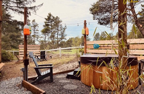 Manzanita House | Hot Tub| King Suite| walk to beach|Views
