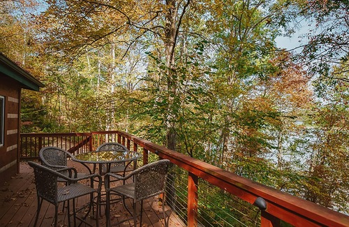 Heltonville Cabin | Hot tub overlooking Lake Monroe. Pet Friendly!