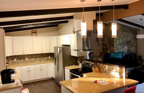 Northeast Anchorage House | Hot Tub, Rain Room shower with Mountiain views of Ski Slopes nestled in nature.