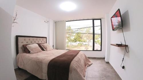 Tababela Hotel | Hotel Suite Central Park Tababela