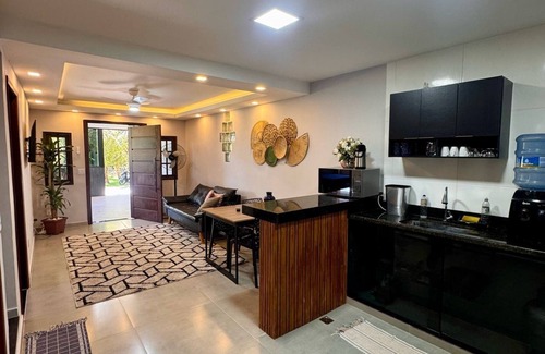 Bracui House | House 15 meters from the beach in a condominium with "feet in the sand"
