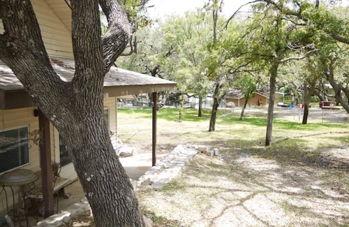 Kingsland Cottage | house and lighted deck fenced yardn