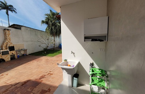 Loteamento Joao Batista Juliao House | House in Guarujá Enseada - Jardim Virginia I