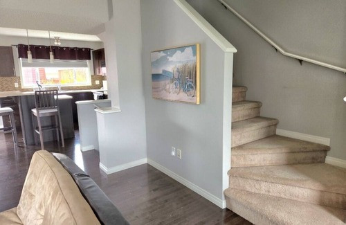 Southeast Edmonton House | House in Summerside with a huge patio and an extra tall garage