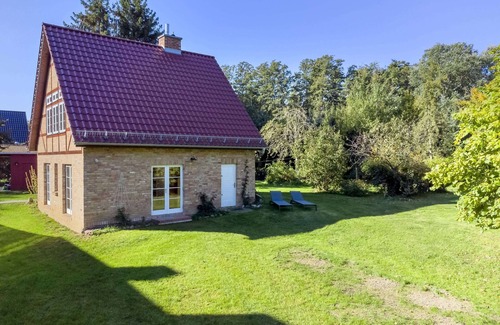 Lassan House | House in the middle of the garden by the swan pond