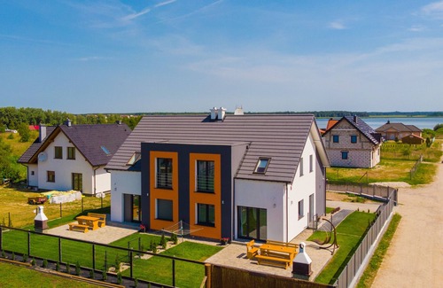 gmina Wolin House | House KATAMARAN Baltic Sea Sea view Garden Terrace Barbecue W-Lan Playground Fishing