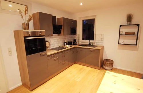 Jemgum Apartment | House on the terp, vacation apartment#1 ground floor
