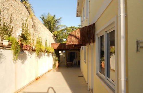 Ossos House | House with foot in the sand, panoramic view, beautiful sunset in point de Buzios.