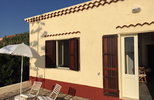 Santa Maria del Mare House | House with garden on the sea, the beach below