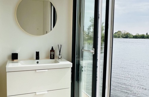 Oud Ade Boat Rental | Houseboat: "De Walvis" with tender. 6p 4+ 2 kids