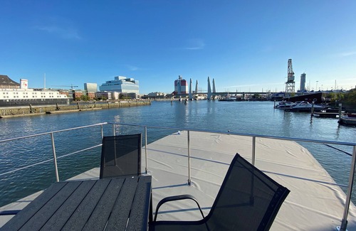 Lundby Boat Rental | Houseboat KUNGSVIKEN with roof terrace in the center of Gothenburg