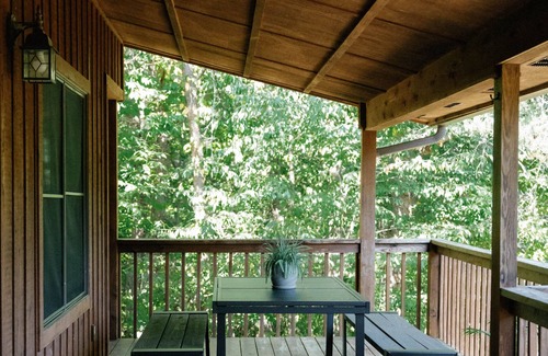 Logan Ski Chalet | Houston Lodge, 5BR Lodge with a large covered porch and a great view