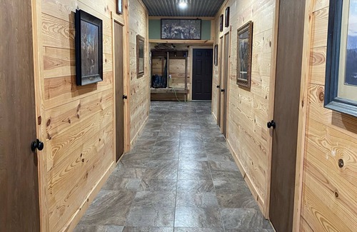 Patterson Cabin | HUGE 11 BD 6 BA CABIN! BAR AND GOLF SIMULATOR INSIDE, OUTDOOR KITCHEN/PROJECTOR