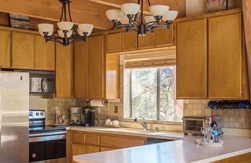 Whispering Forest Cabin | HUGE 3-story modified A-frame w/deck, forest views, hot tub, 10 mins from slopes