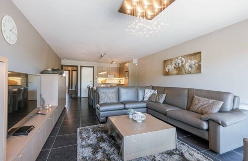 Bredene Apartment | Huswell - Bright seaside apartment with parking